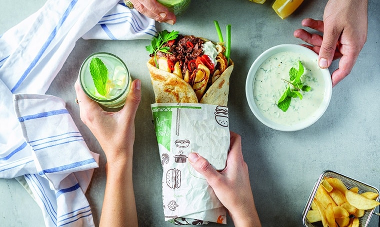 Redefine shawarma in lafa with tahini and chips