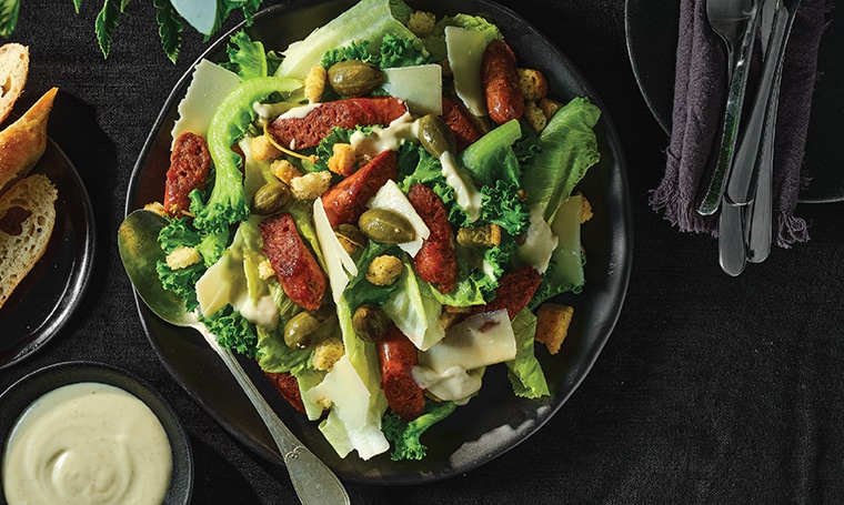 Lettuce salad, broccoli, peas and Redifine sausages