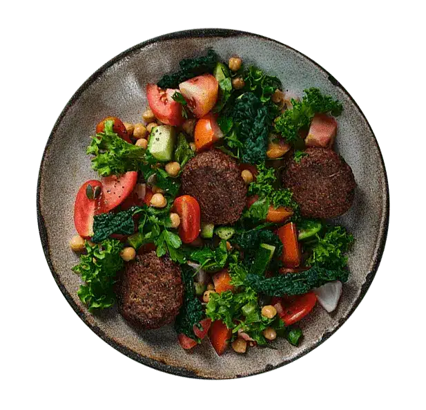 Köfte, Typ Lamm auf frischem Gemüse