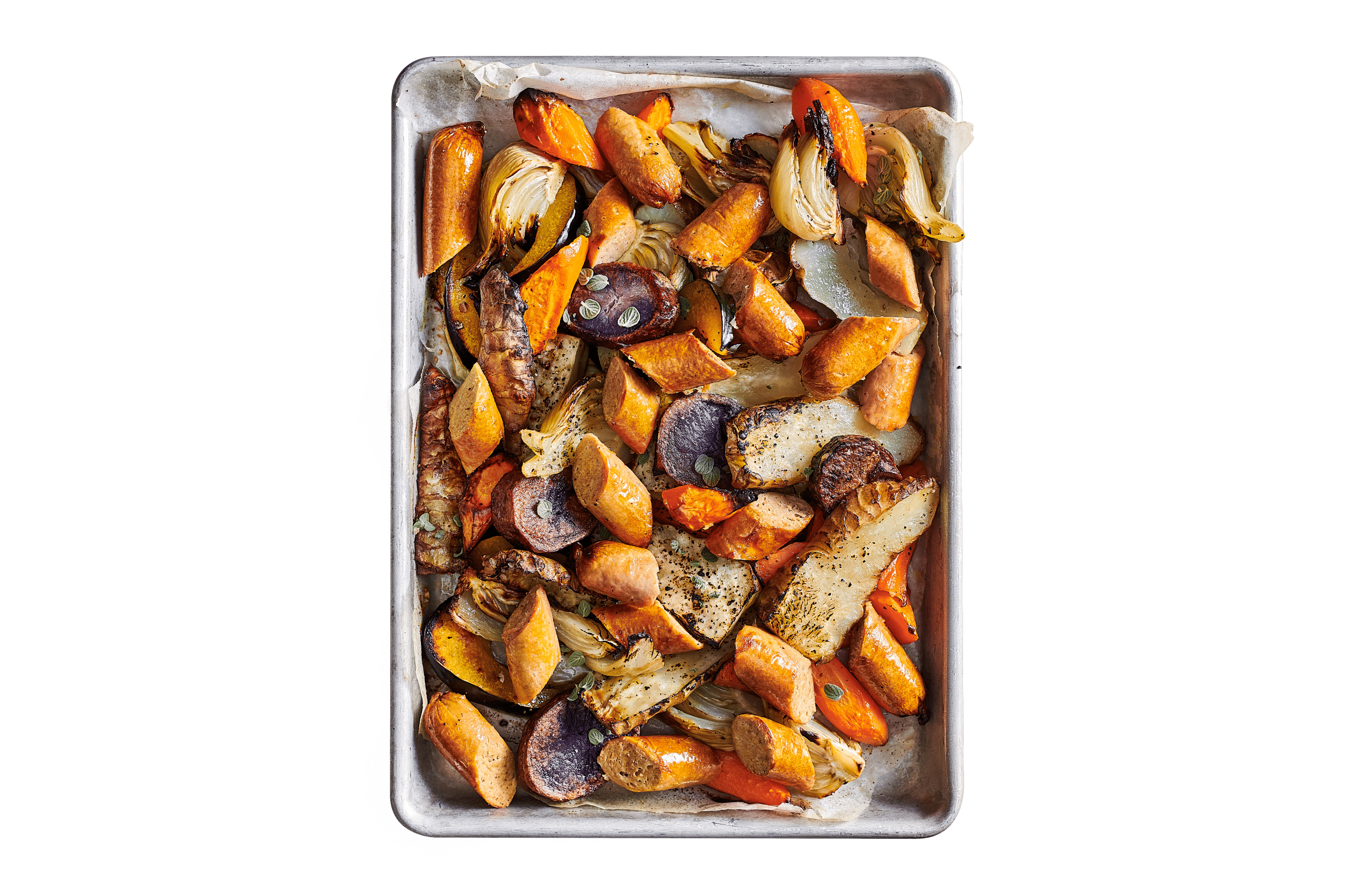 נקניקיות בראטוורסט בתנור לצד ירקות צלויים